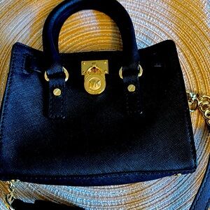 Michael Kors “evening” bag.